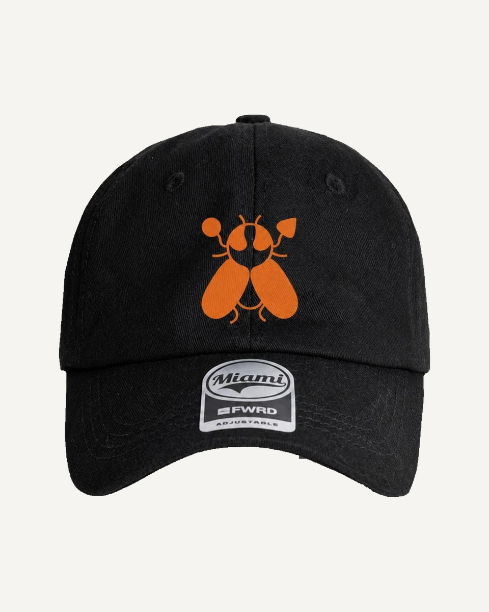 SACXESS Miami Cap in Black with the fly mark in orange.